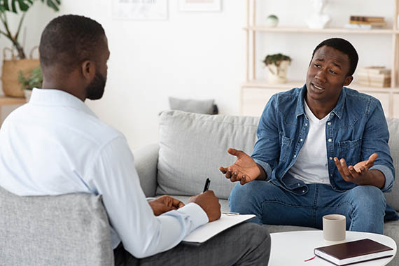 Young man receiving therapy and treatment for mental health in our adolescent program.