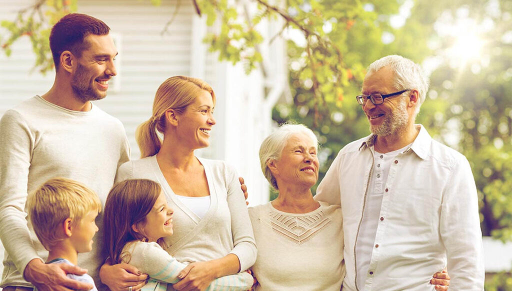 Family standing together outside, signifying how genetics can affect addiction