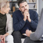 A woman helps her husband choose the right rehab to get help for his alcohol addiction.