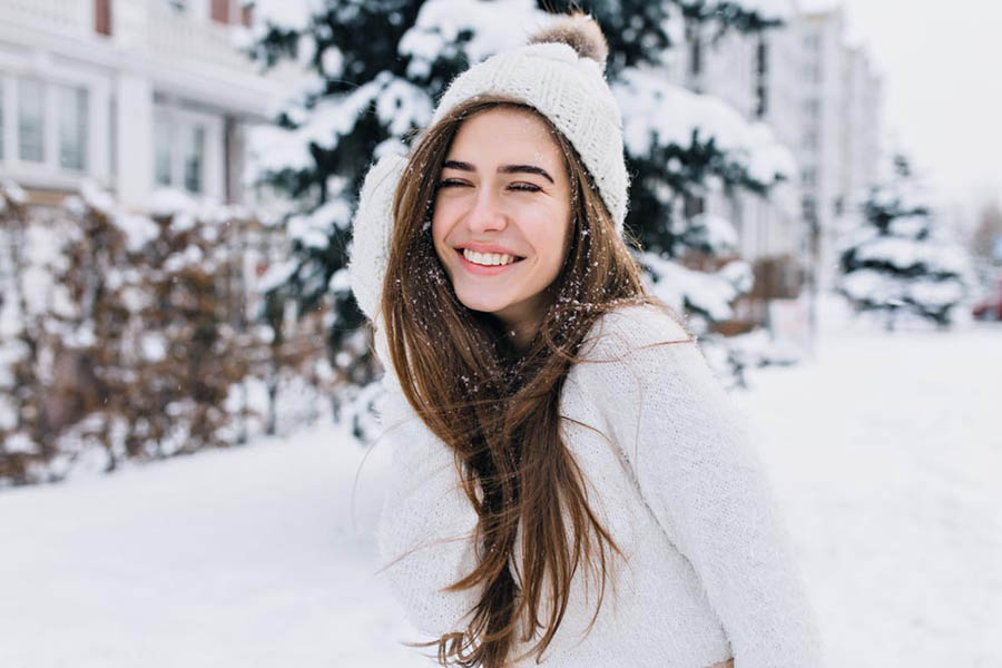 A young adult enjoys some time outdoors in the winter as an important part of a routine for staying sober from drugs and alcohol.