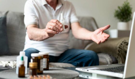 Old man talking about his opioid misuse in a video call