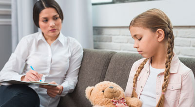 Child talking to a therapist