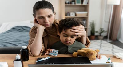 woman holding her child worried about her addiction