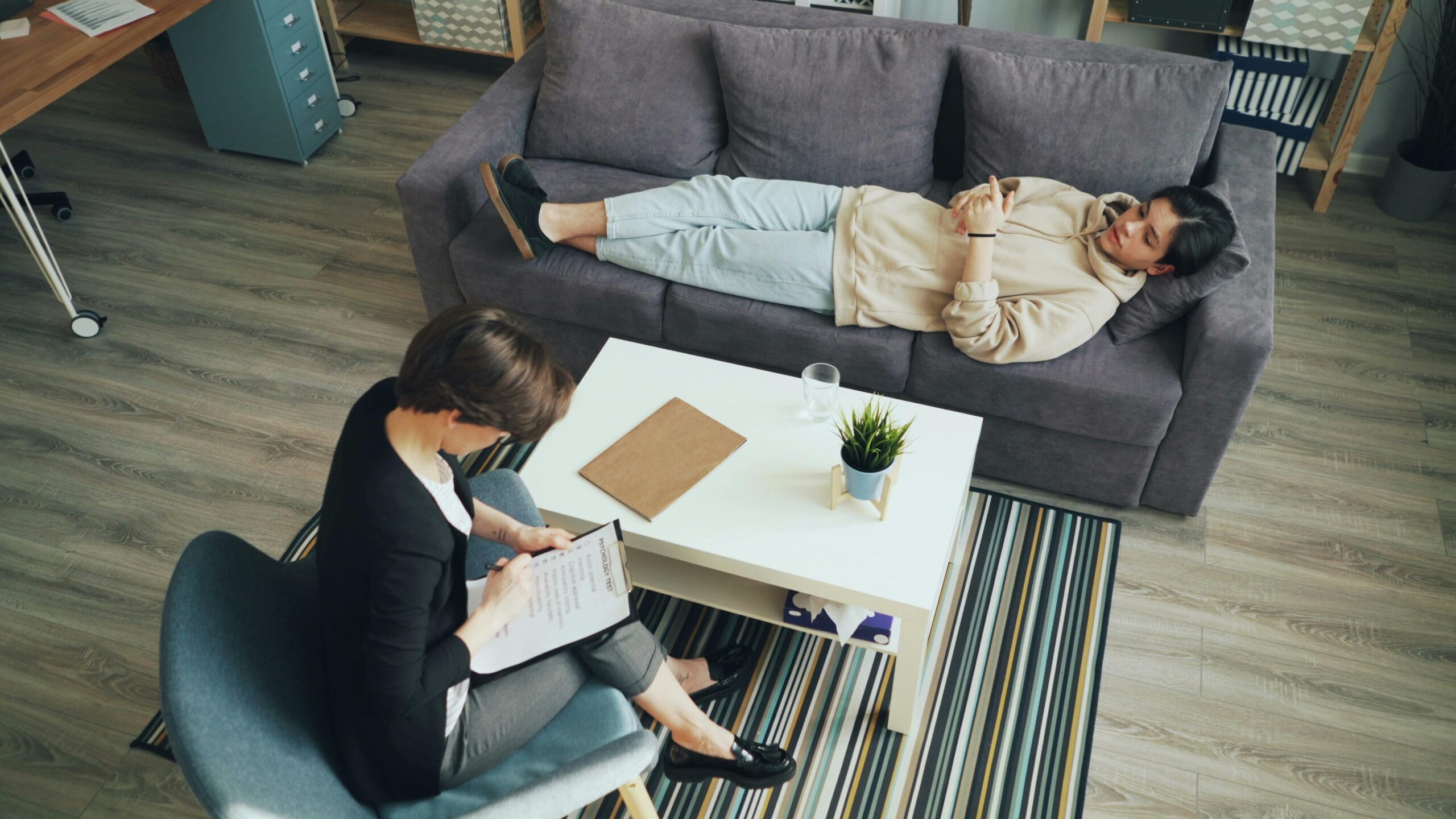 Woman laying on a couch during a therapy session: Trauma-Focused Cognitive Behavioral Therapy: How It Works and Its Benefits 12 South Recovery