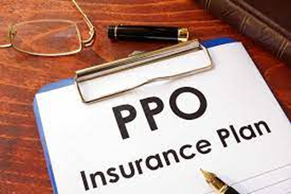 PPO insurance plan document on a clipboard with a pen and glasses, representing health coverage options for addiction treatment and rehabs that accept PPO insurance.