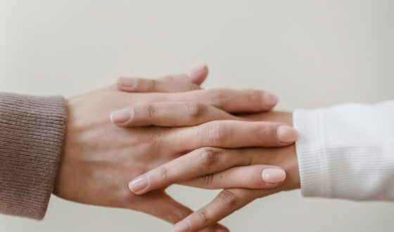 Hands holding in support representing outpatient treatment in Lake Forest at 12 South Recovery for addiction recovery and ongoing accountability.