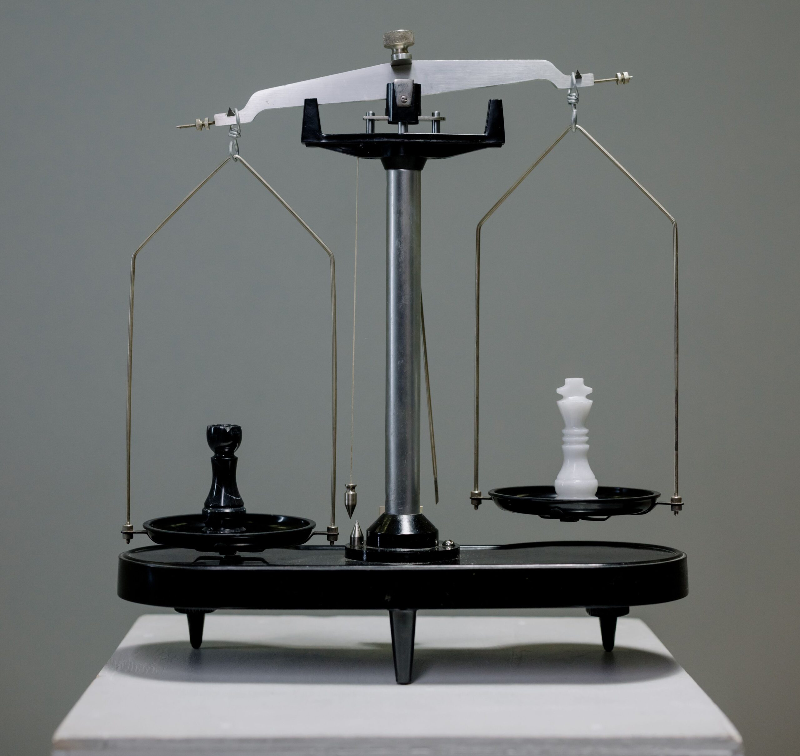 Balance scale symbolizing the comparison between PHP vs IOP treatment programs, helping individuals evaluate the right level of care based on their recovery needs and clinical support requirements.